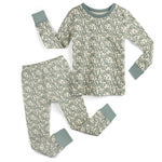 Children's pajama set with a green snake pattern on a white background