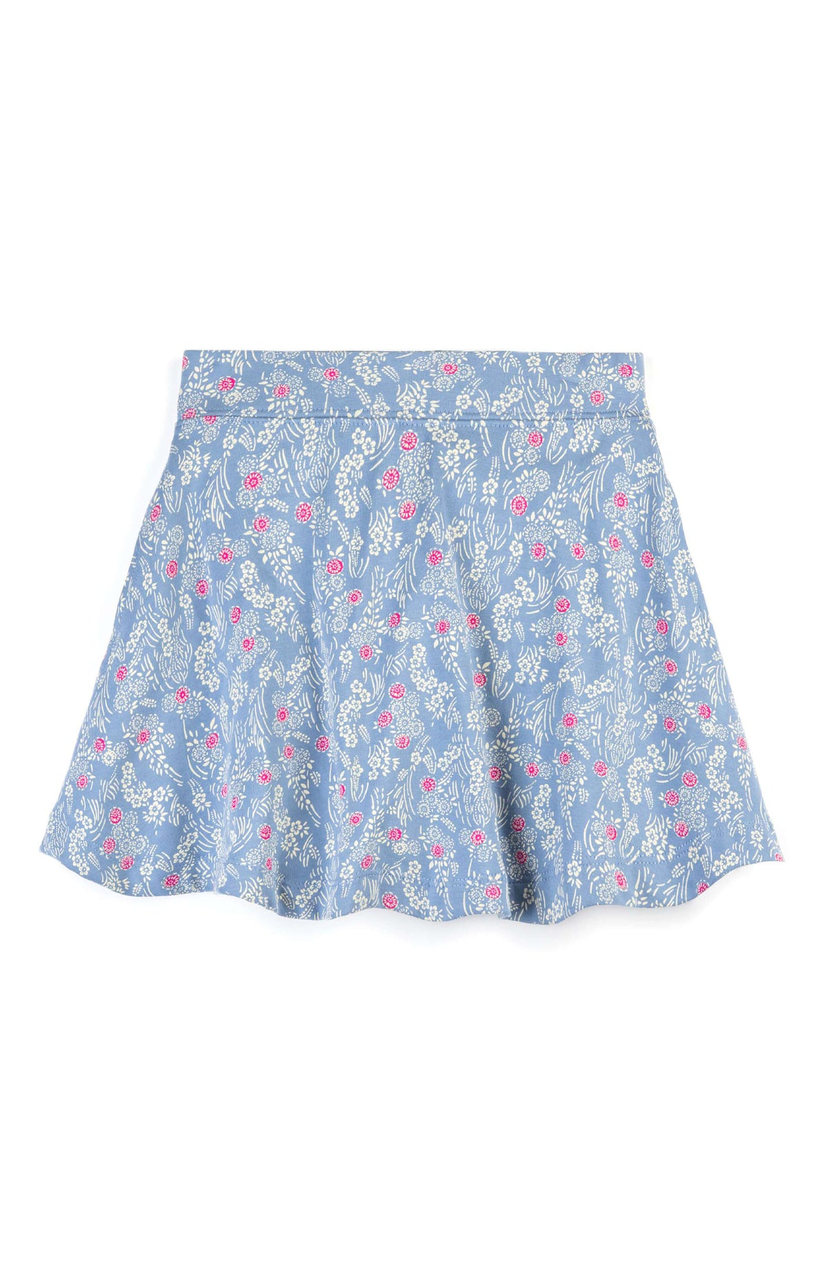 A light blue skort with a delicate white floral and leaf print, accented with small pink flowers, shown flat against a white background.