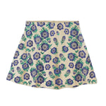 Floral patterned skirt with purple flowers on a white background